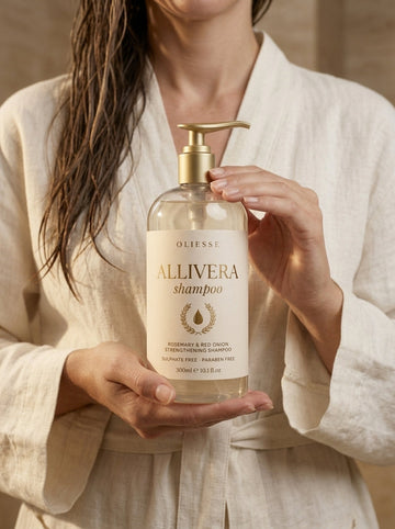 Oliesse Allivera shampoo bottle with zinc pyrithione on a shower ledge